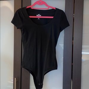 Hollister black body suit in size medium